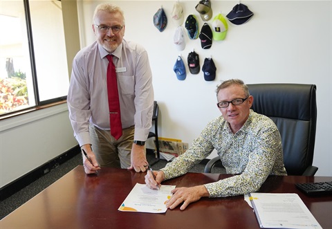 CEO_Terry_Dodds_and_Mayor_Adam_Belot_Signing_the_Small_Business_Friendly_Committment_adopted_by_Council_June_2025.jpg