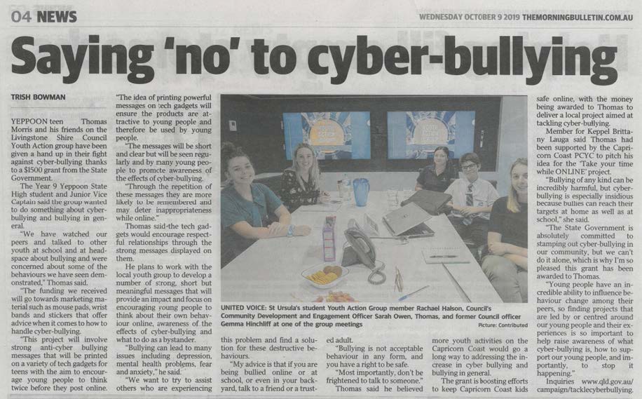 Newspaper article on Yeppoon teens tackling cyberbullying, with a photo of a group meeting around a table.
